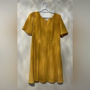 Short yellow dress w/a cut out at the top to show off you.